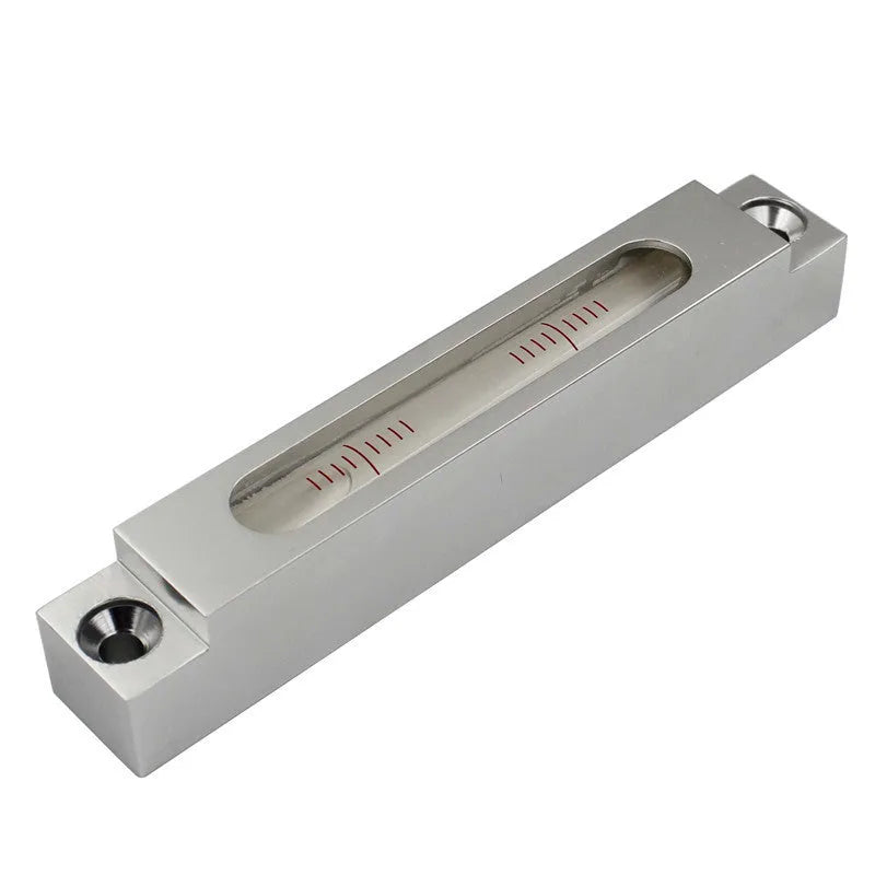 Metal and glass miniature precision spirit level for machine tools, showing 132mm length.