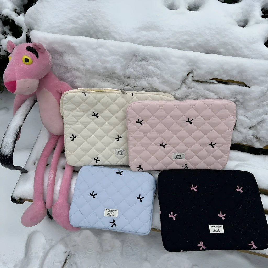 Notebook storage bag with rhombus embroidery and bow decoration in nylon fabric
