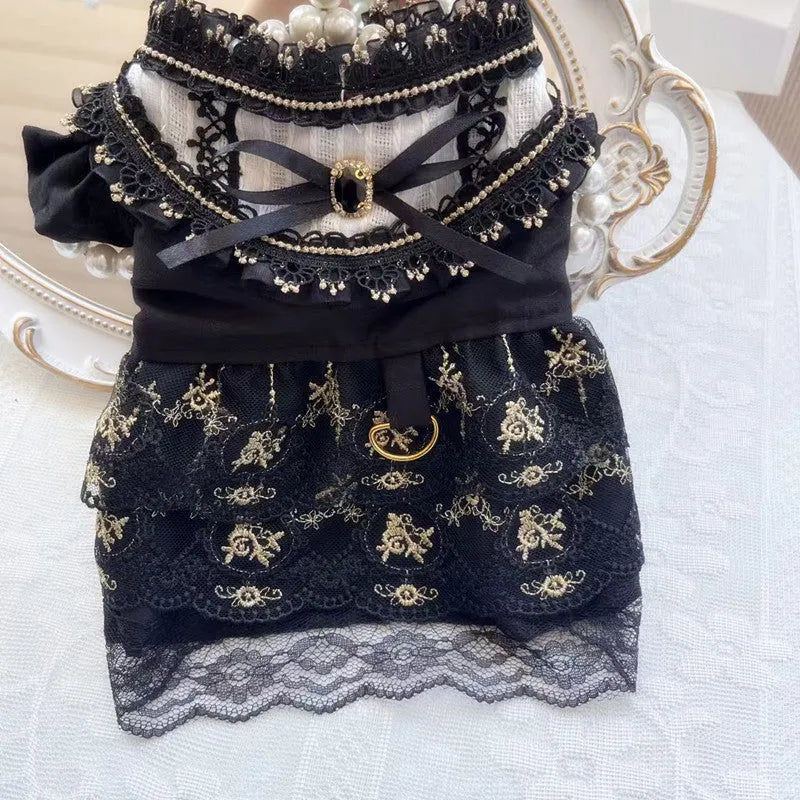 Golden gothic-style princess skirt pet clothing for cats or dogs on a mannequin