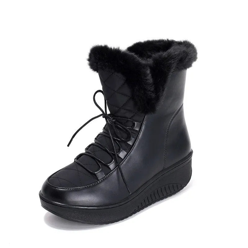 Women's black platform winter boots with lace-up closure and plush lining.