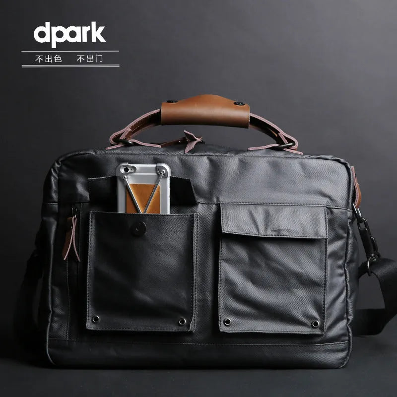 Dpark black laptop shoulder bag for 14 or 15 inch laptops like Lenovo and Apple MacBooks.