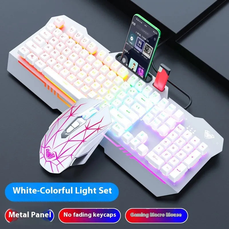 Metal mechanical keyboard bundle with gaming mouse, headset, and optional mouse pad on a desk.