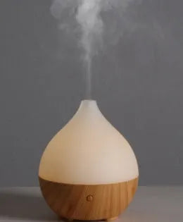 Asakusa wood grain vase-shaped USB aroma diffuser on a surface