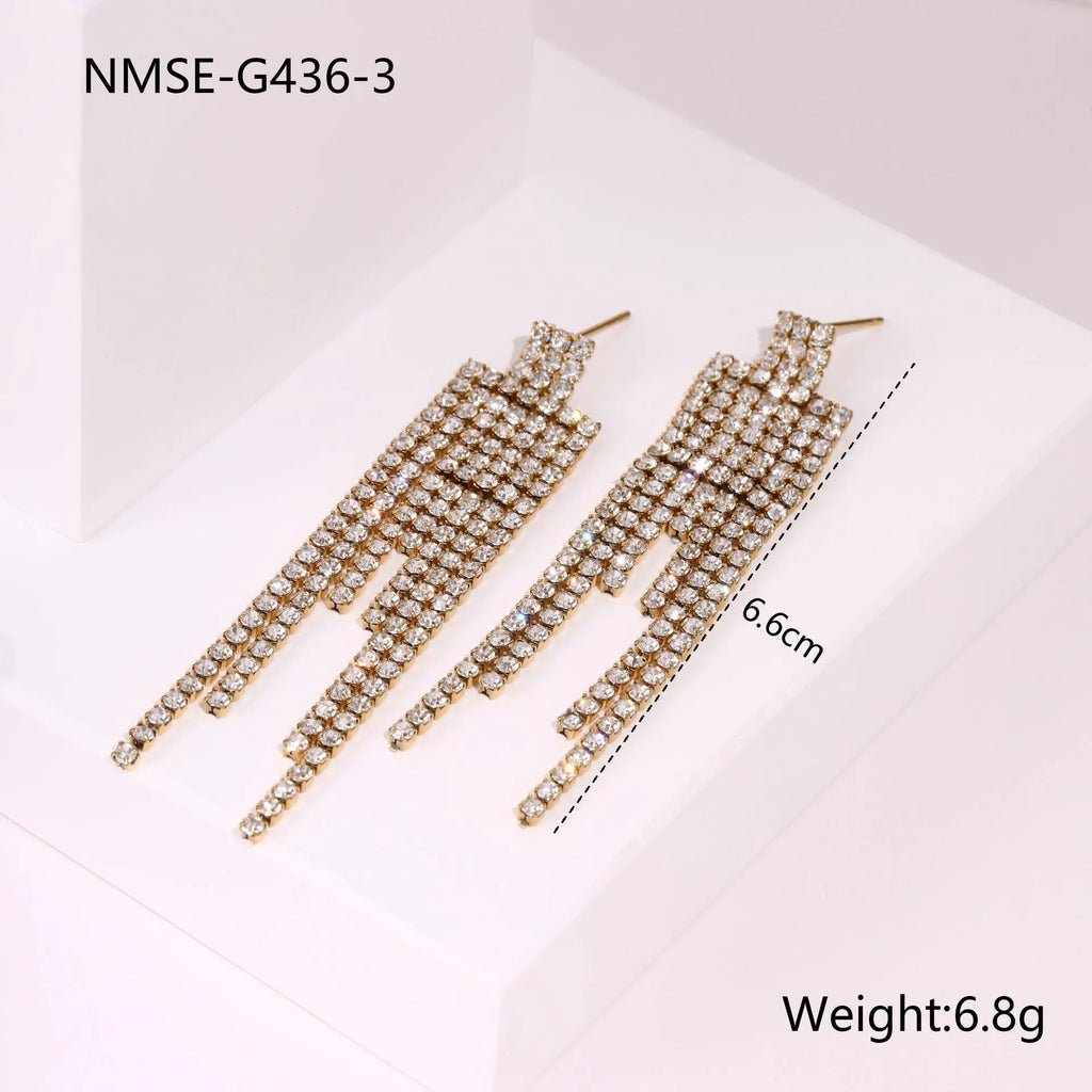 Women's stainless steel earrings with gold plated heart and star shapes in an irregular geometric design.