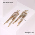 Women's stainless steel earrings with gold plated heart and star shapes in an irregular geometric design.