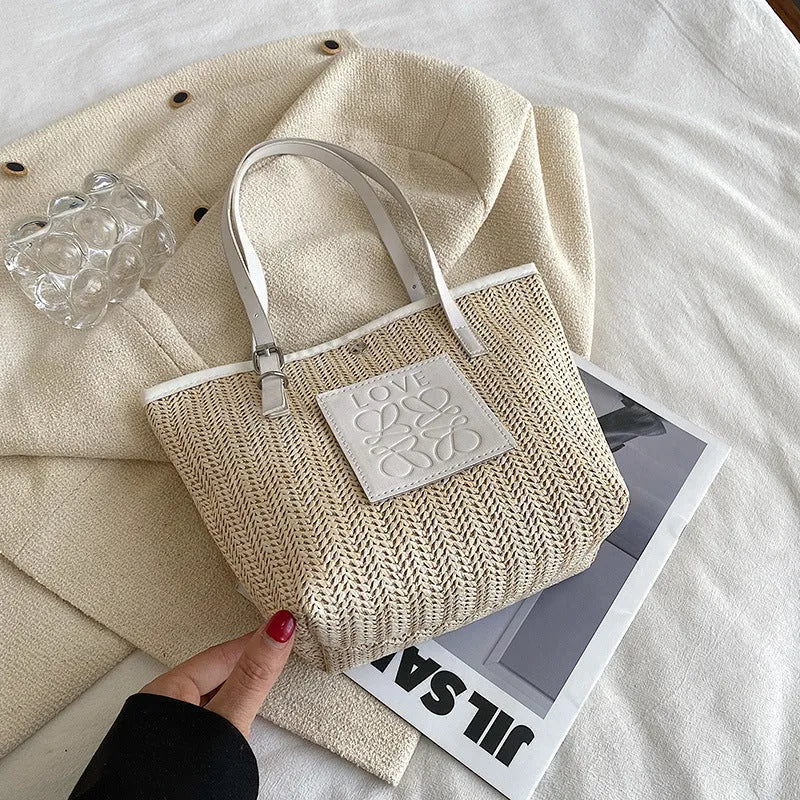 Straw woven women's shoulder bag in retro style with three-dimensional pocket