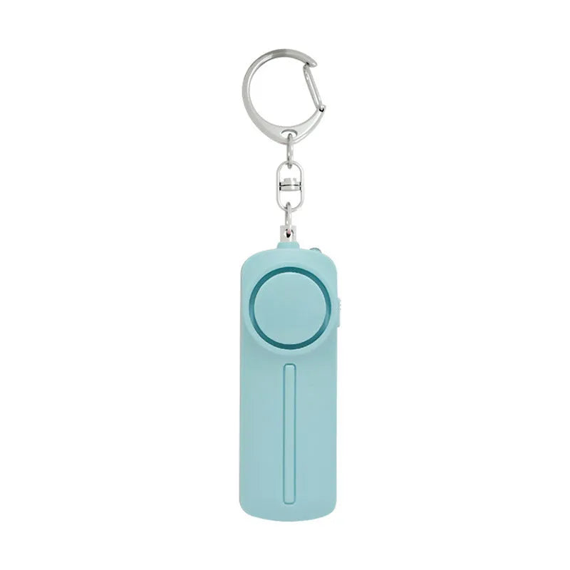 Girls personal safety alarm with keychain attachment in various colours showing compact dimensions