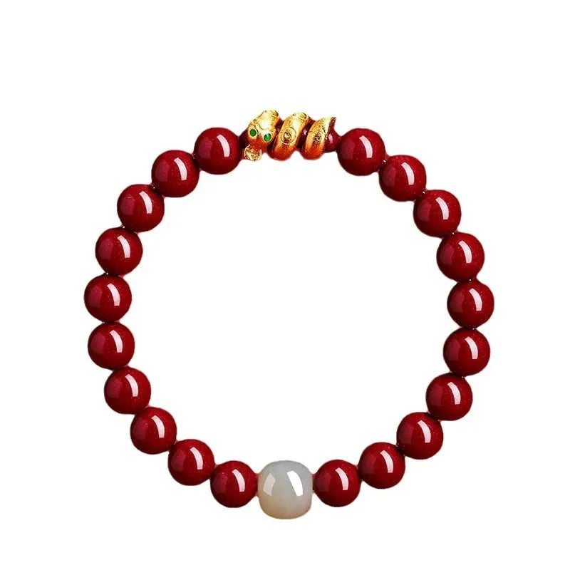 Handmade cinnabar snake zodiac bracelet with roll beads, shown in Chinese style.