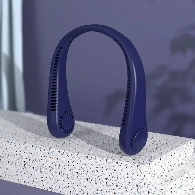 White bladeless neck fan worn around a person's neck, showing the air outlets and flexible neckband.