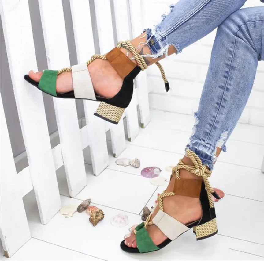 Women's beige suede fashion sandals with ankle strap and fish mouth toe on a rubber sole.