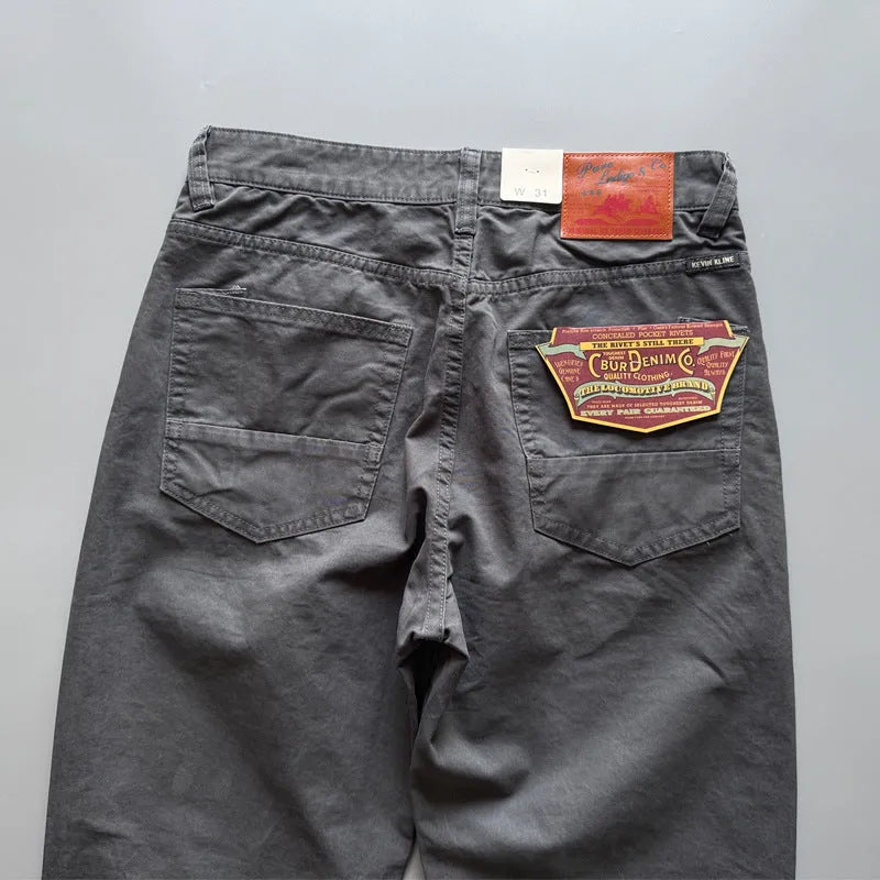 Men's straight-leg casual cotton trousers in army green, shown laid flat.