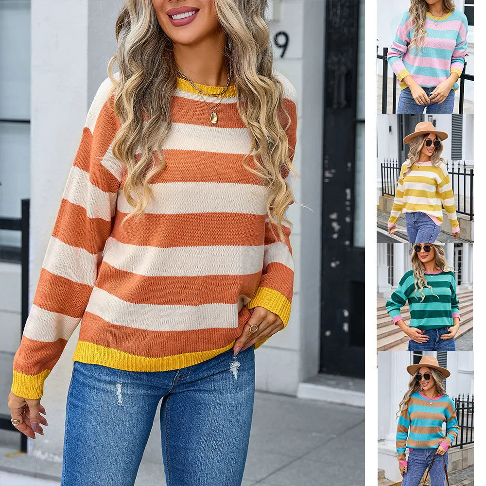Women's loose blue acrylic long sleeve sweater with round neck on hanger