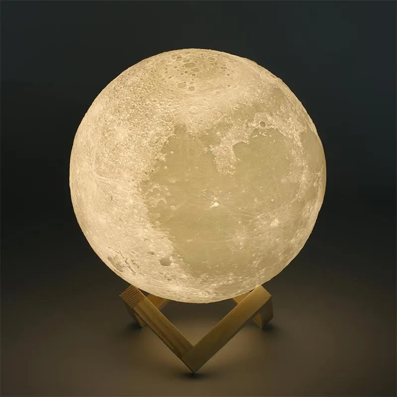 3D printed spherical moon lamp on a wooden stand with touch ring control