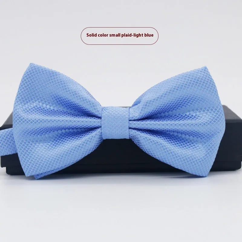 Men's flat head solid colour bow tie in polyester, showing 12cm by 6cm size on a background.