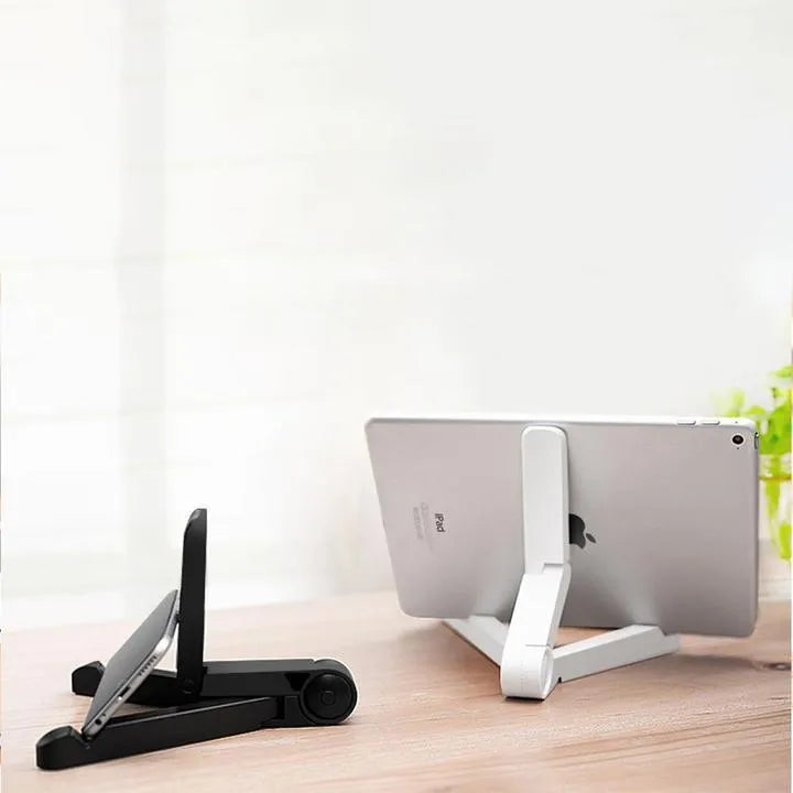 Black foldable tablet holder holding a smartphone in landscape mode on a desk.