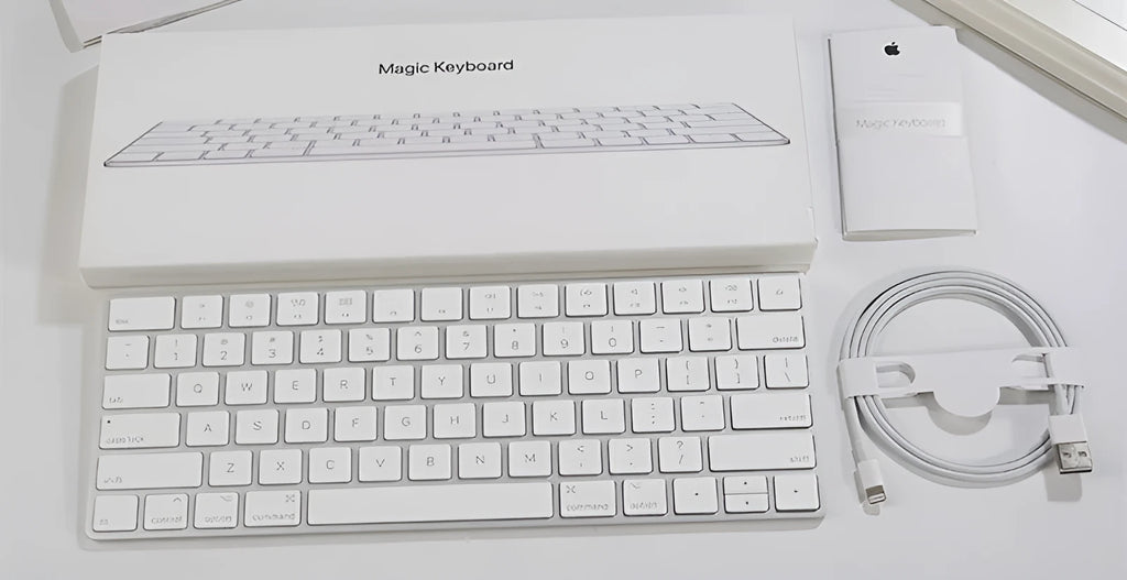 Apple G6 ultra-thin aluminium Bluetooth wireless keyboard in white, showing multimedia function keys.