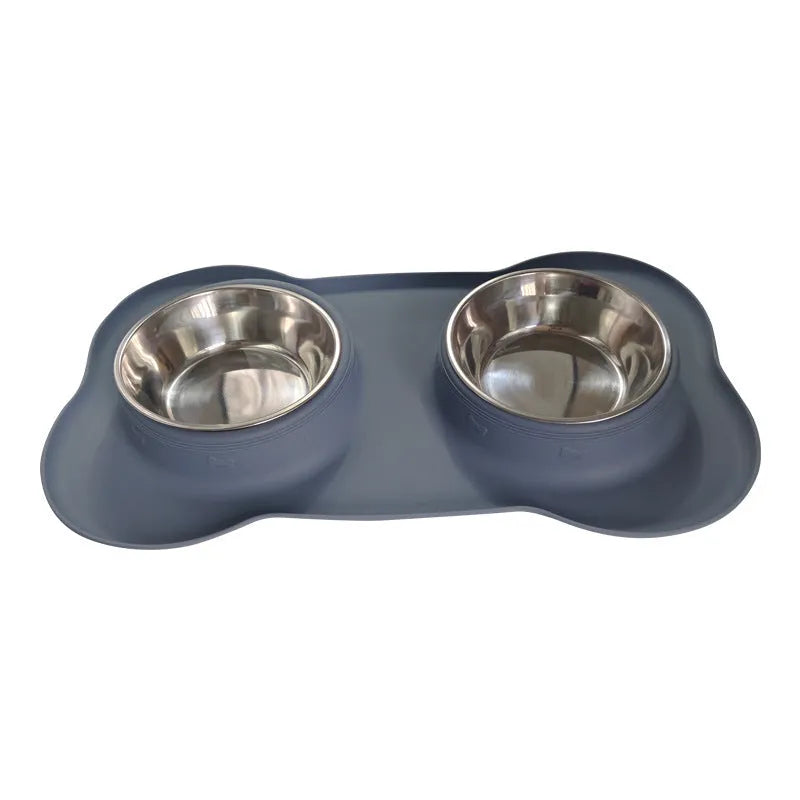 Large elevated silicone dog bowl with stainless steel insert in choice of colours on a kitchen floor.