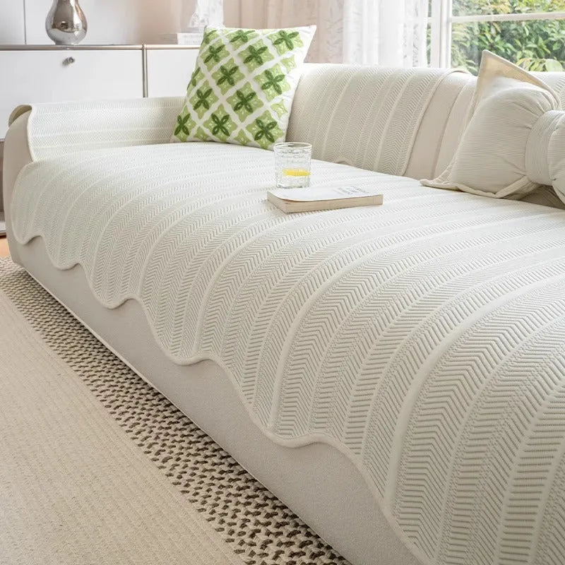 Ice silk sofa cover with non-slip design in jelly green colour on a three-seater sofa