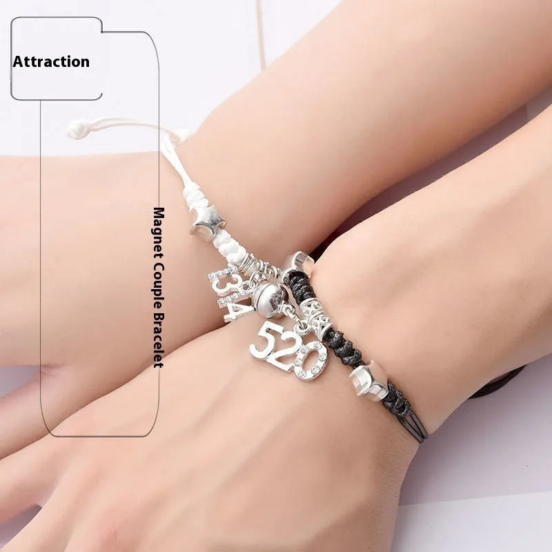 Pair of alloy suction bracelets with engraved symbol choices including crown, love lock, and clover.