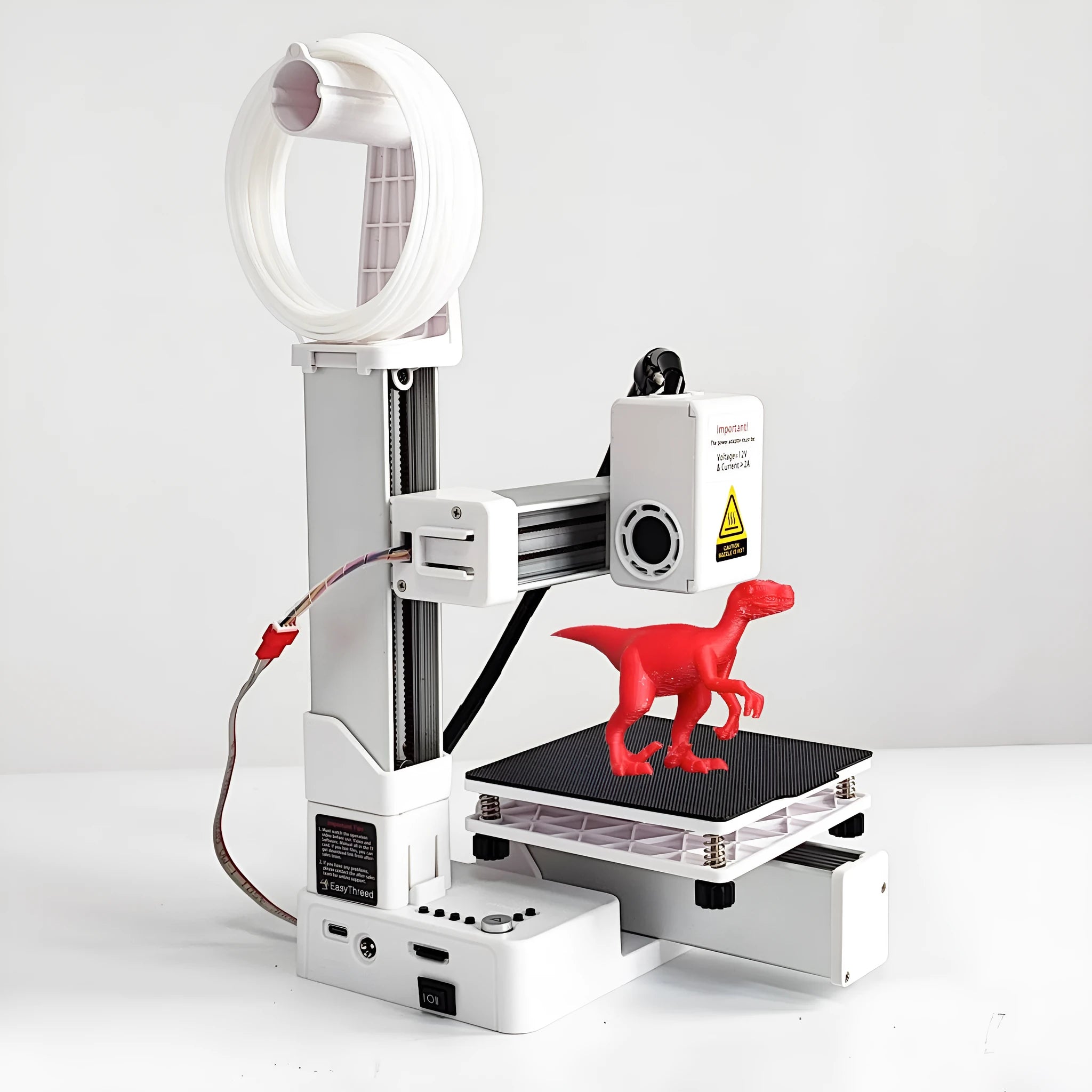 White EasyThreed K10 entry-level 3D printer on a desk