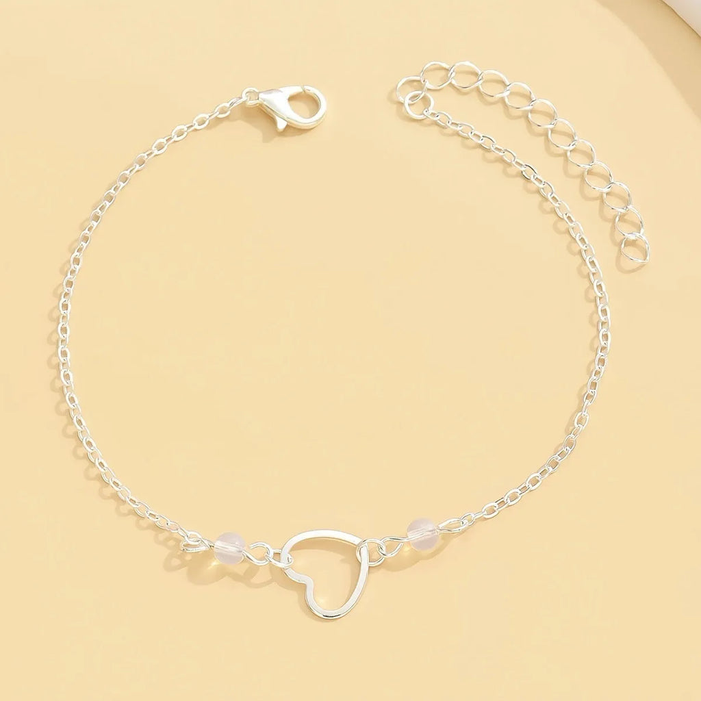 Women's adjustable ankle bracelet with geometric heart pendant in gold or silver alloy