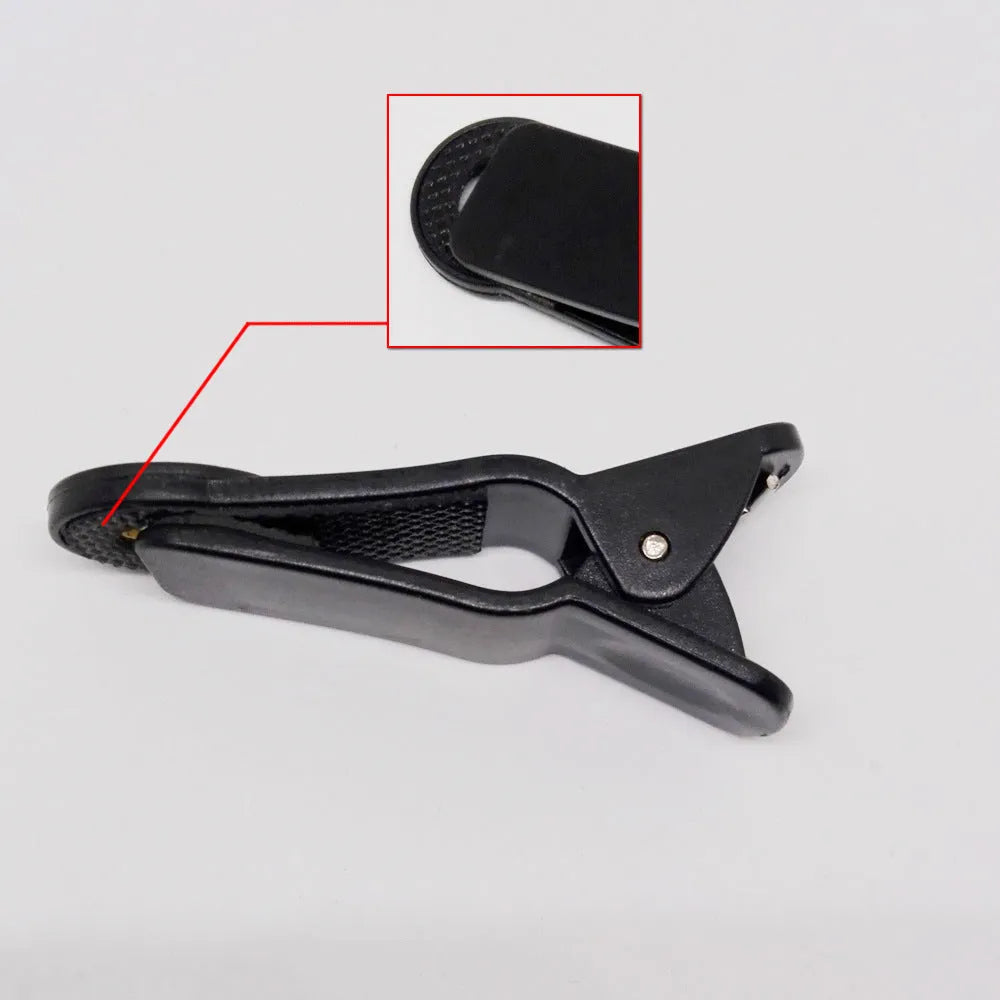 12x telescopic zoom lens attached via universal clip to a smartphone for long-distance filming.