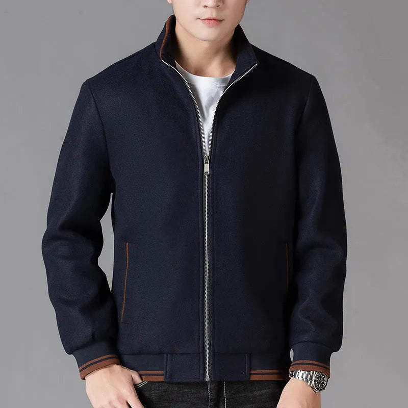 Men's grey zip-up fleece jacket with a stick pocket, shown in a sports style.
