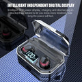 Black wireless Bluetooth headset with charging case on a table.