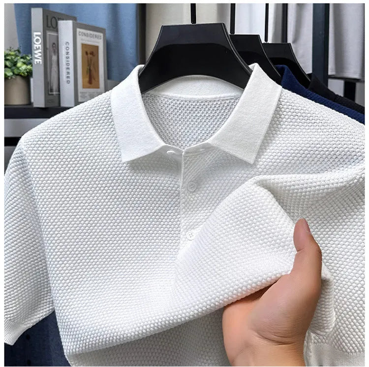Loose fit pure cotton short sleeve pullover sweater in grey on a hanger.