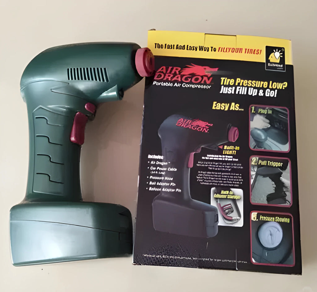 Compact black 12V portable car tyre inflator with motor and air hose for emergency use.
