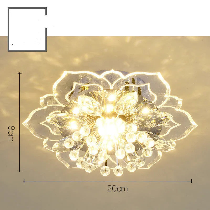 Small modern crystal ceiling lamp with flower-shaped shade in crystal, acrylic, and stainless steel materials