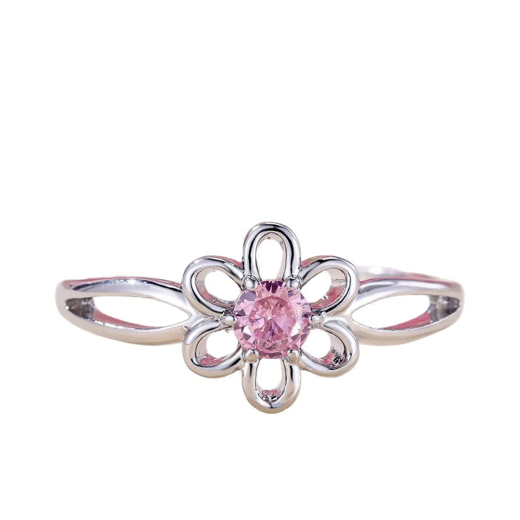 Lady's hollowed floral fashion ring in electroplated copper, platinum pink diamond colour.