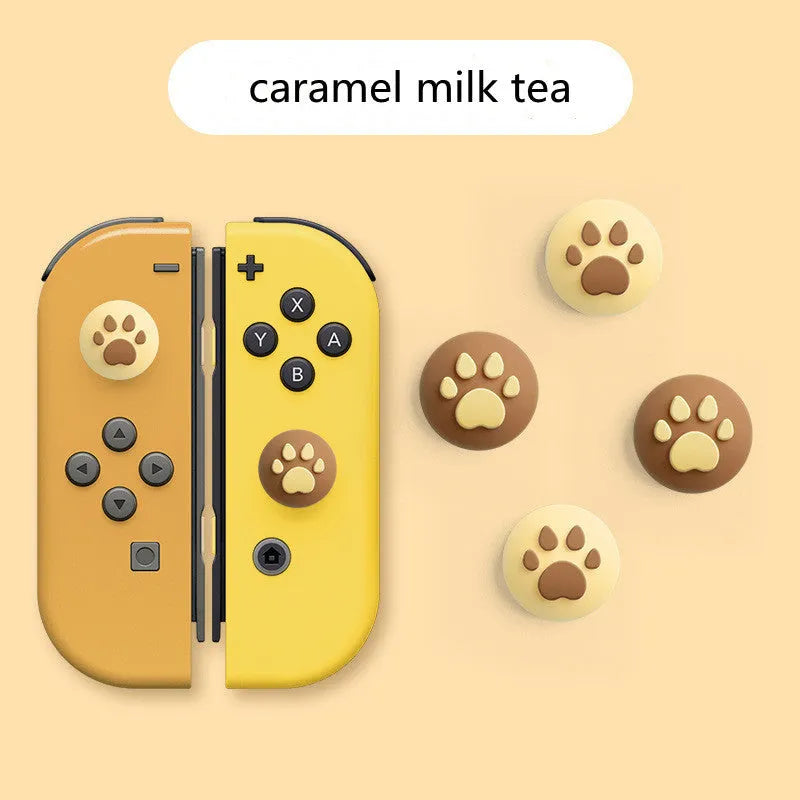 Four silicone rocker caps for Nintendo consoles in various colour combinations