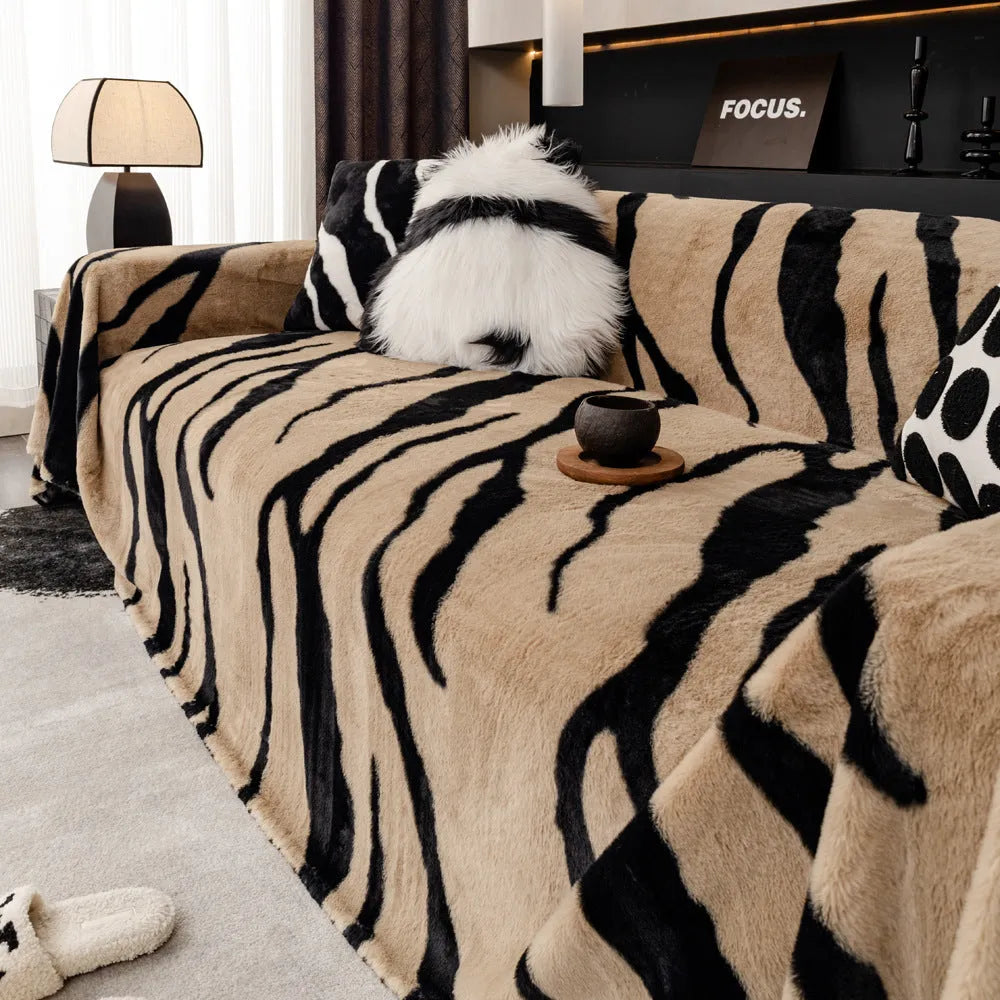 Zebra pattern flannel sofa cover with non-slip design on furniture