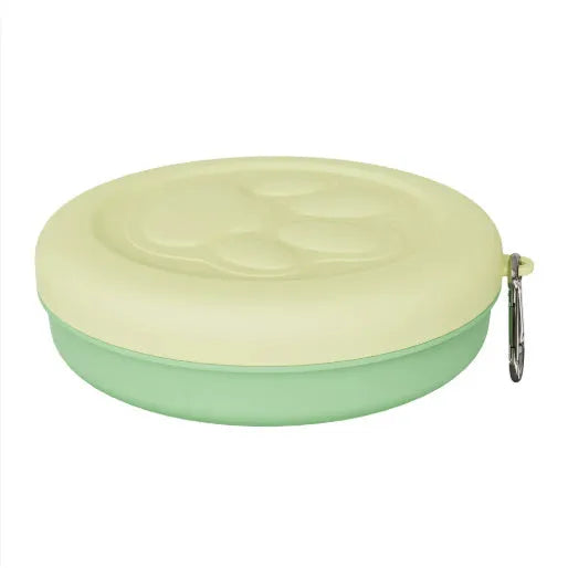 Collapsible silicone dog food and water bowl in pink and green colours, shown in both open and flattened positions