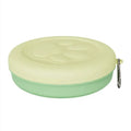 Collapsible silicone dog food and water bowl in pink and green colours, shown in both open and flattened positions