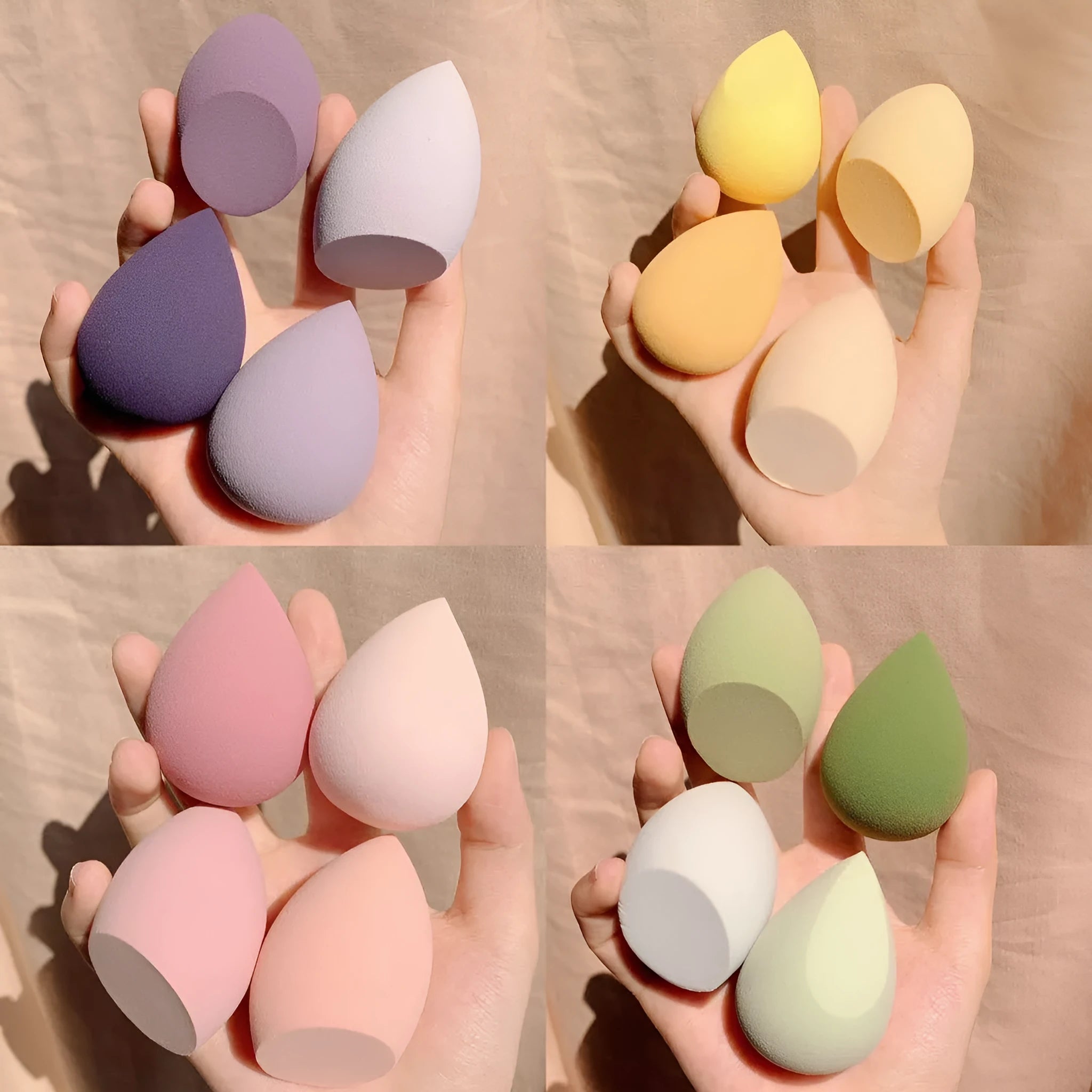 Four makeup sponge eggs in colours grape, mango, mint, and peach on a white background.