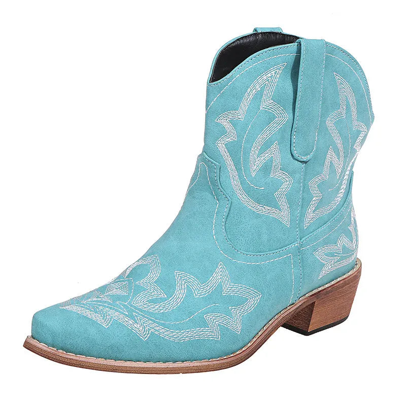 Women's blue embroidered Western cowgirl boots with a low wedge heel and pointed toe.