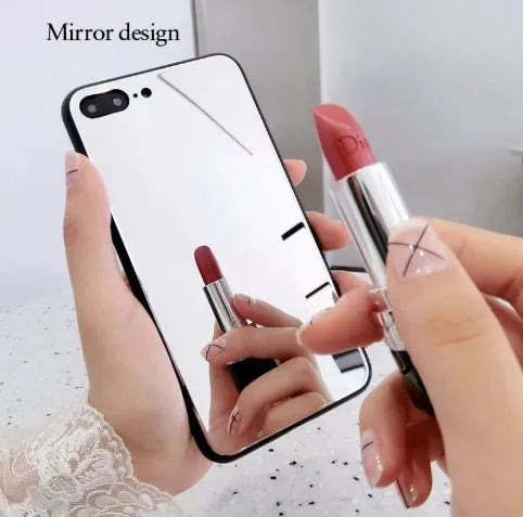 Black iPhone mirror phone case showing reflective glass back, compatible with multiple iPhone models.