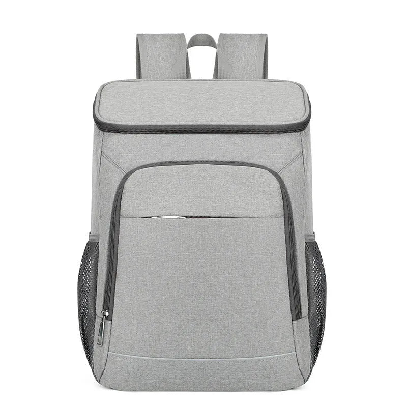 Large black outdoor backpack with curved shoulder straps showing expansion compartments for thermal picnic storage