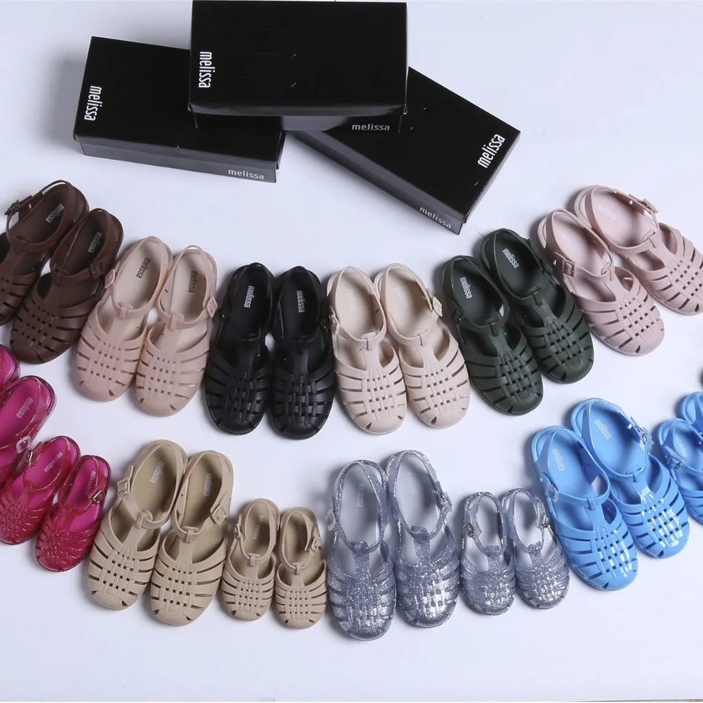 Vintage weave Roman sandals in PVC with buckle fastener, shown in a choice of ten colours.
