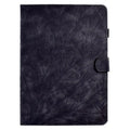 Imitation leather tablet case in black with integrated stand bracket, shown next to a tablet.