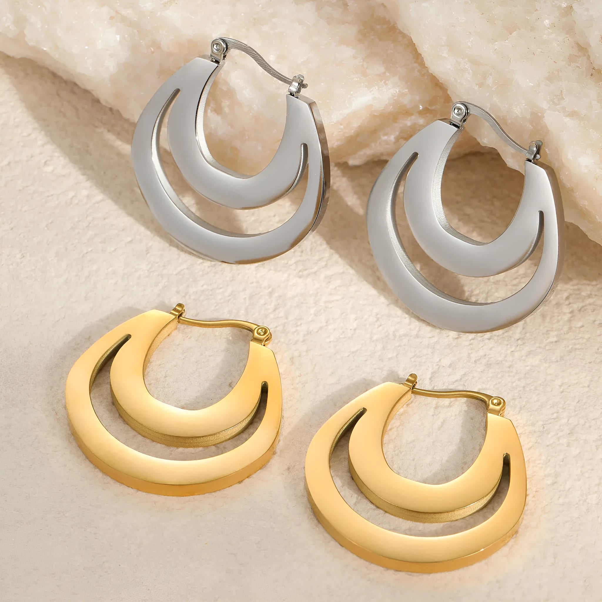 Geometric circular French earrings with gold plating on stainless steel, minimalist design