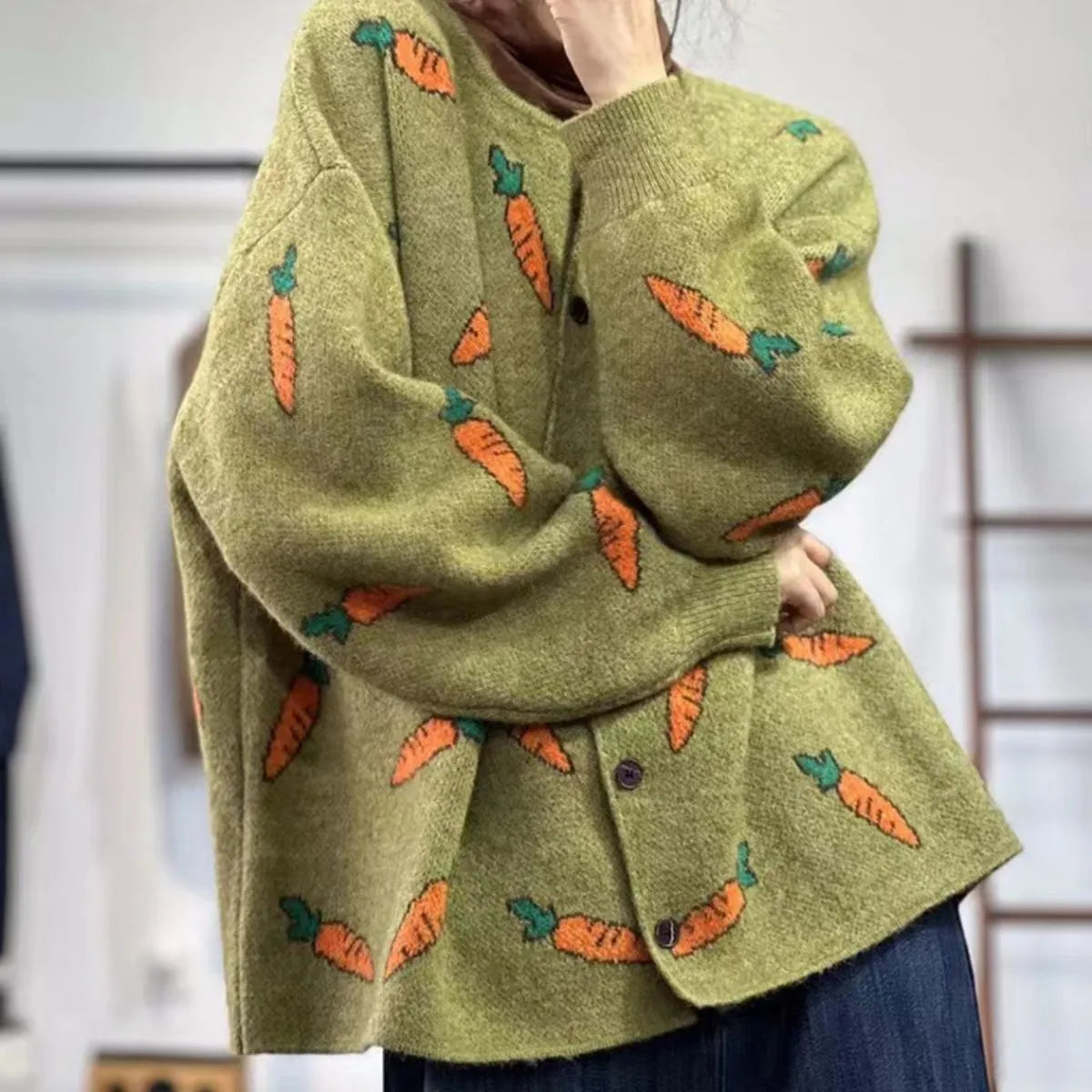 Round neck loose cardigan with Mori artistic colour contrast print, made from viscose fibre.