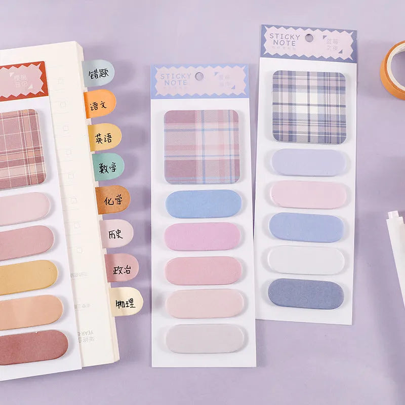 Set of six colourful plaid design sticky note memo pads, each with 20 sheets, showing various solid colours.