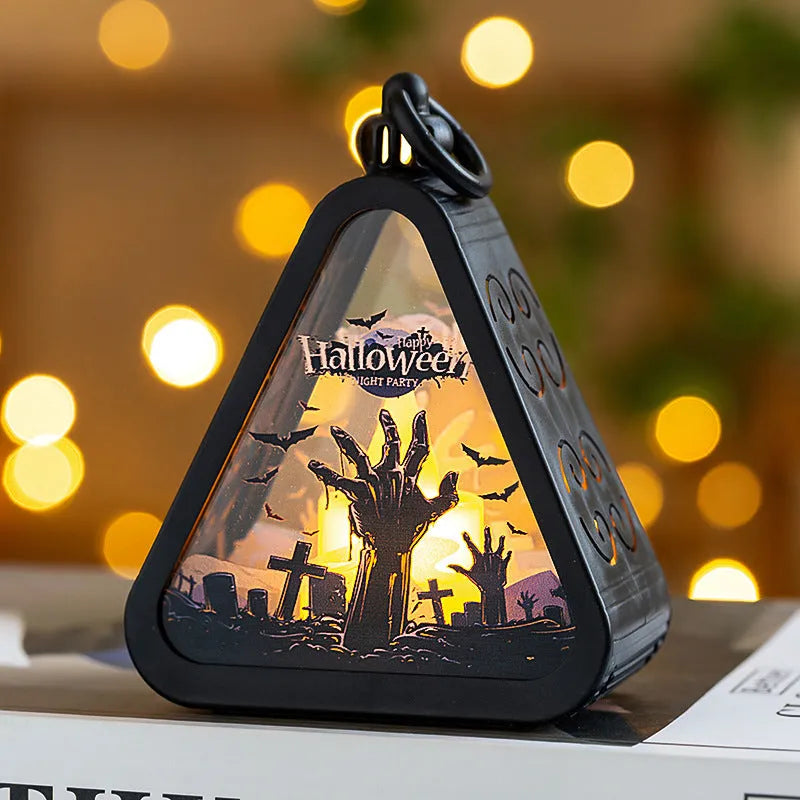 Portable Halloween pumpkin lamp decoration in plastic and glass with four colour theme options