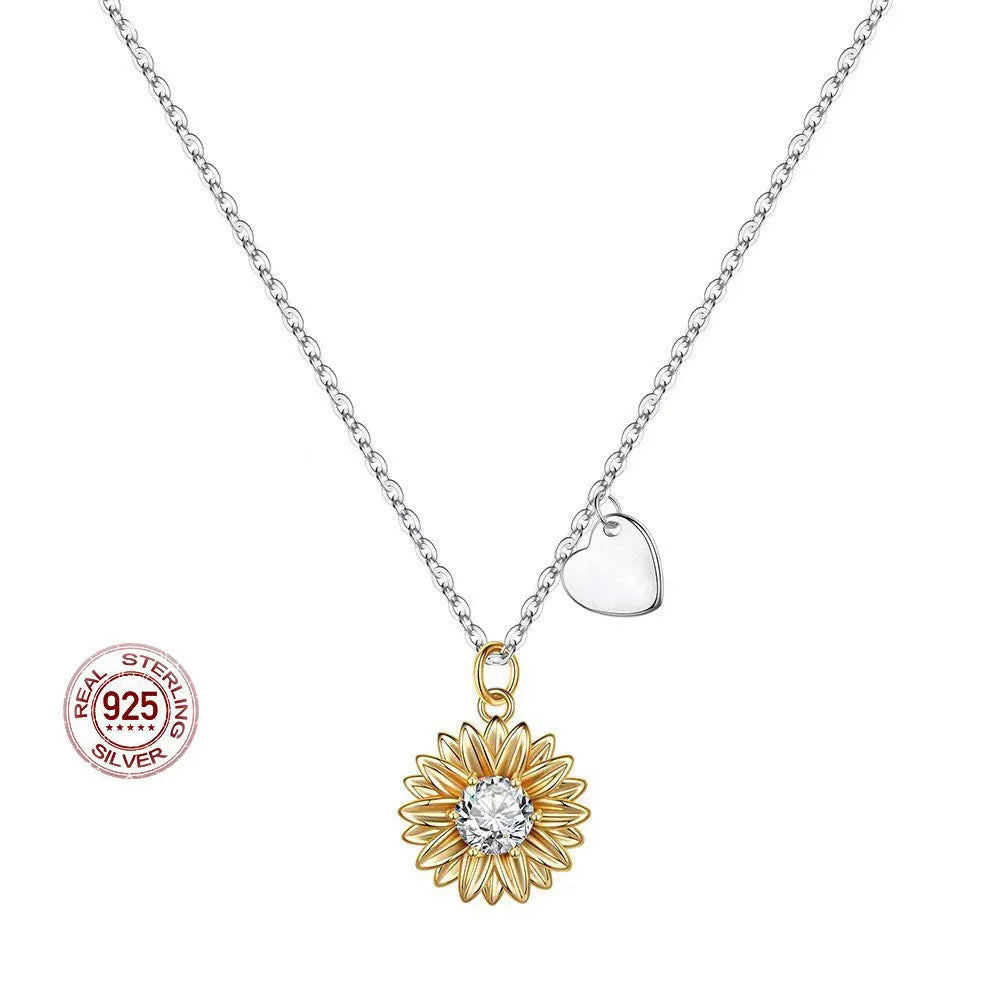 Sunflower pendant necklace in 925 silver on adjustable chain showing geometric petal details