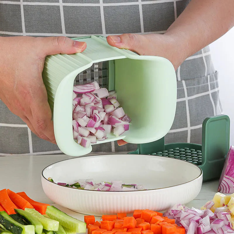 Green multifunctional vegetable chopper with hand pressure mechanism and stainless steel blade for slicing onions and potatoes