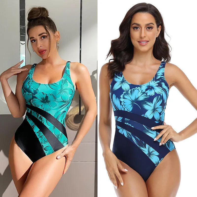 Women's blue printed one-piece swimsuit with conservative brief style on mannequin