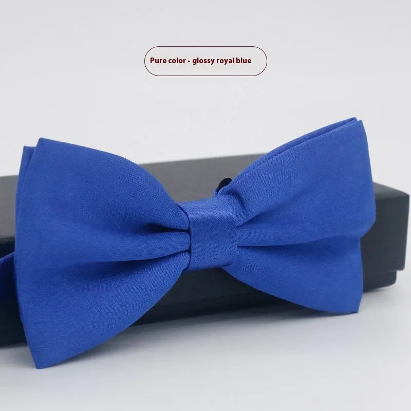 Men's flat head solid colour bow tie in polyester, showing 12cm by 6cm size on a background.